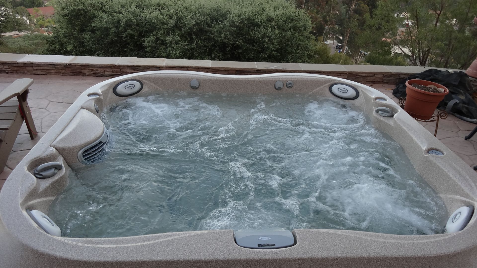 To keep your hot tub clean like this one, learn everything you need to know about hot tub alkalinity.